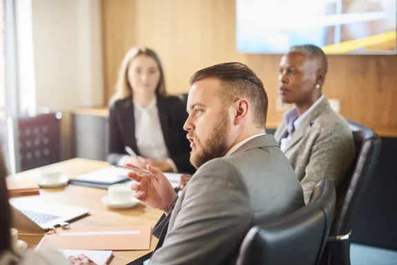 Management team meeting in the boardroom.